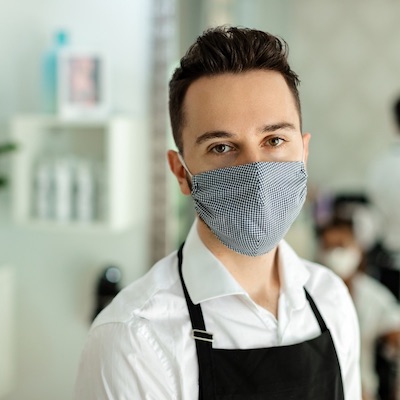 Hairstylist with a mask