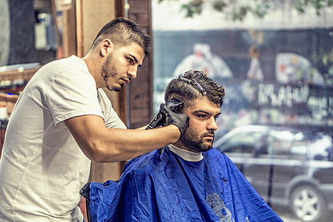Barber and Client in a Barbershop