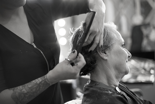 senior women getting a haircut